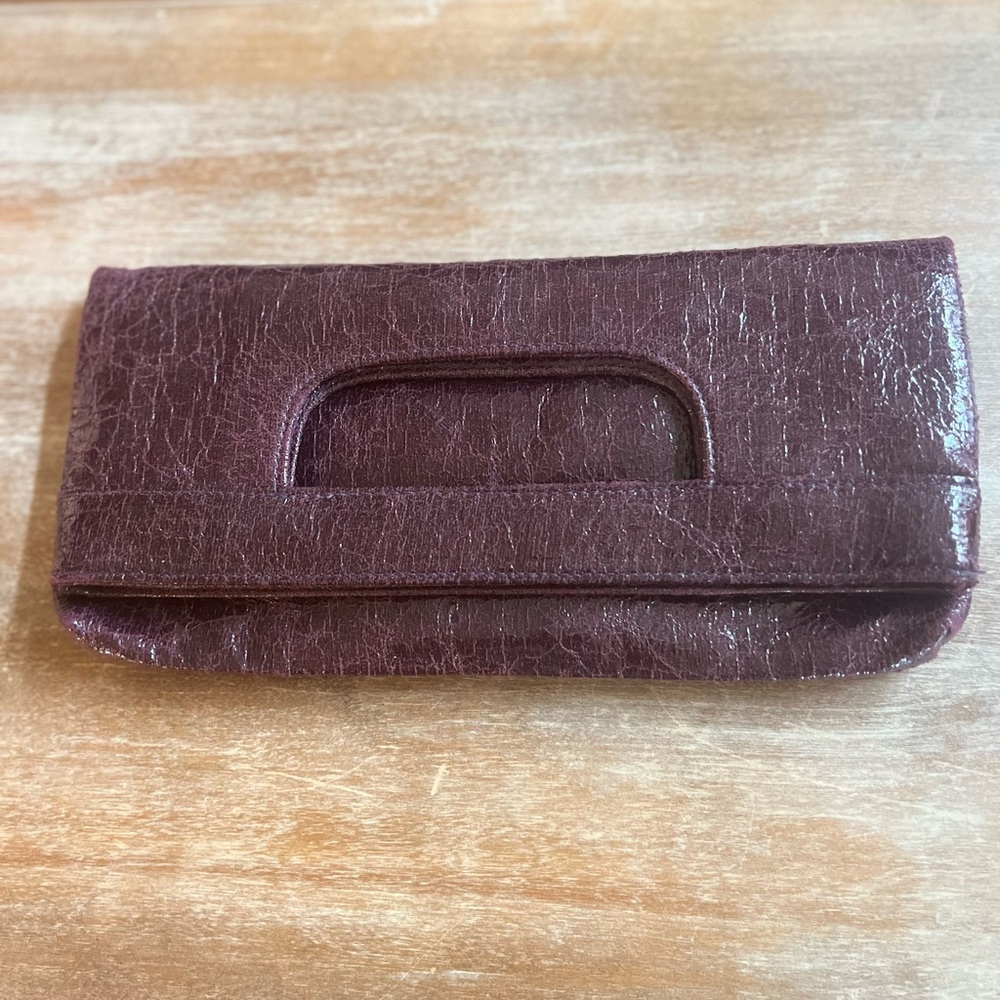 CACHÈ Fold-Over Handled Crackle-Finished Clutch Bag